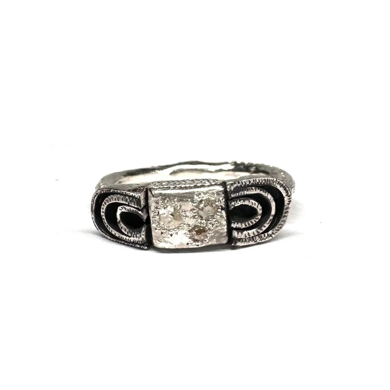 Series of One #176
Oxidised sterling silver, diamonds.

Three unique diamonds, different colours and cuts.

#unique #precious #diamondring #katherinebowmanjewellery