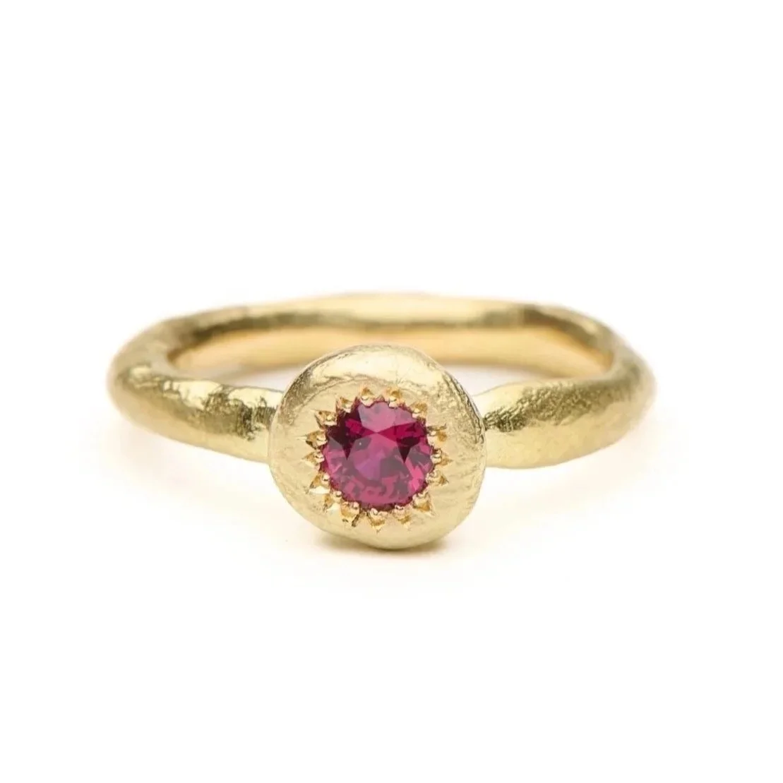 In the realms of folklore, rubies are seen as the gemstone of love. The rich red, like blood is life force, full of vitality and passion.

The To Hold ring is handmade in 18ct yellow gold and set with the most magnificent ruby.

The To Hold Ring is a