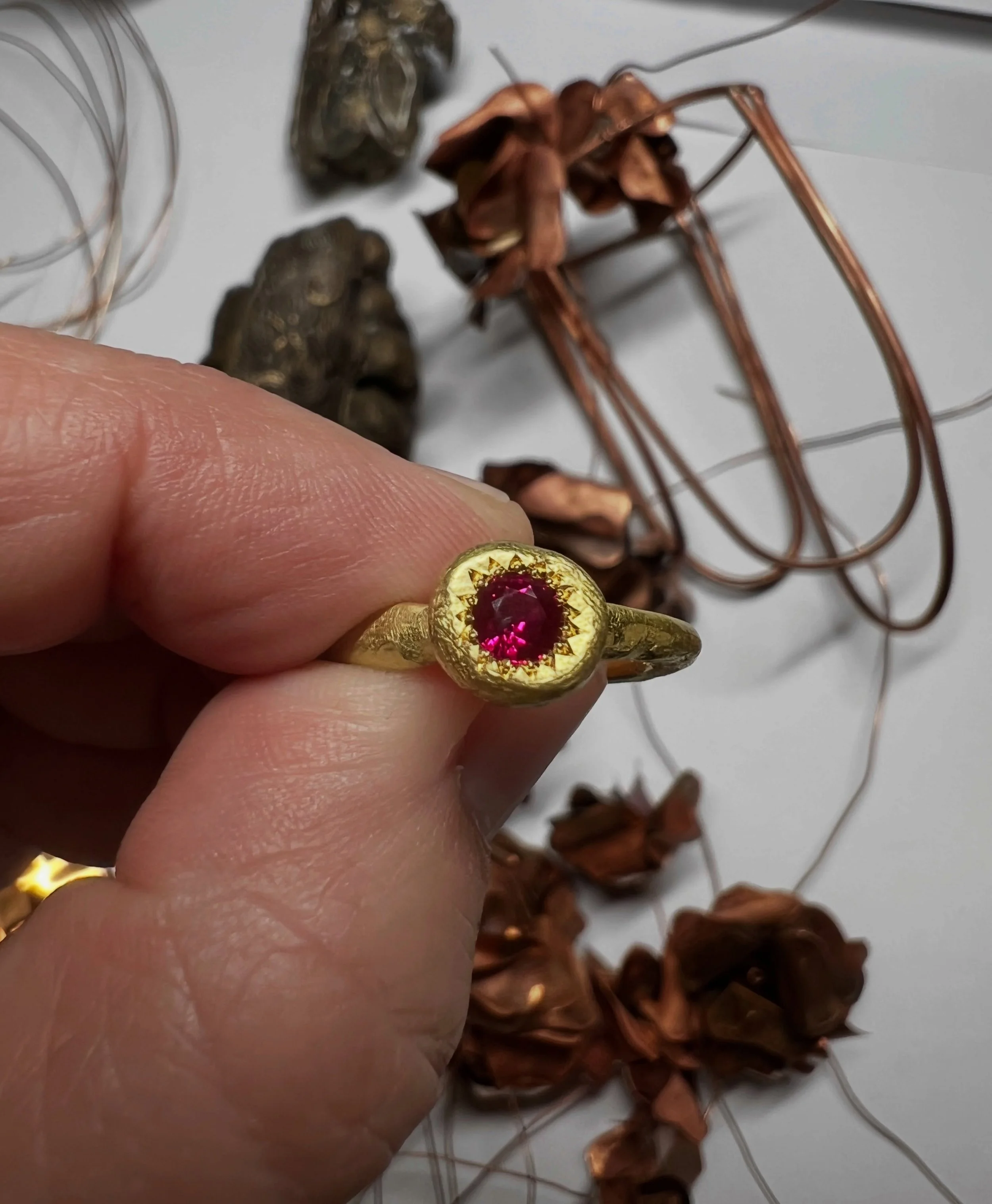 In the realms of folklore, rubies are seen as the gemstone of love. The rich red, like blood is life force, full of vitality and passion.

The To Hold ring is handmade in 18ct yellow gold and set with the most magnificent ruby.

The To Hold Ring is a