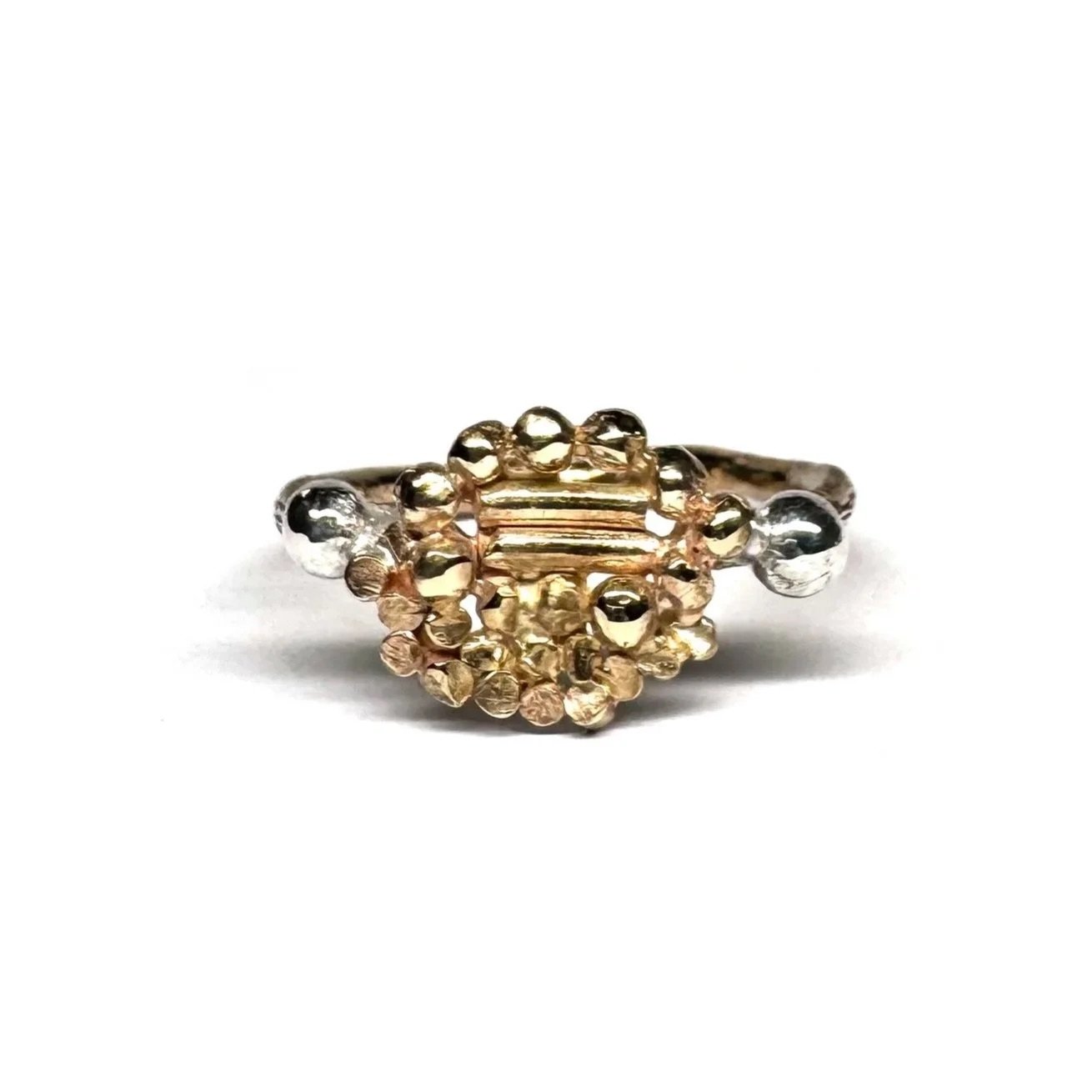 #181. Series of One.
Handmade 9ct yellow gold ring with sterling silver details and hand engraving.

Three new rings have been added to my Series of One collection, continuing an exploration of fragmented embroidery motifs that began in an earlier gr