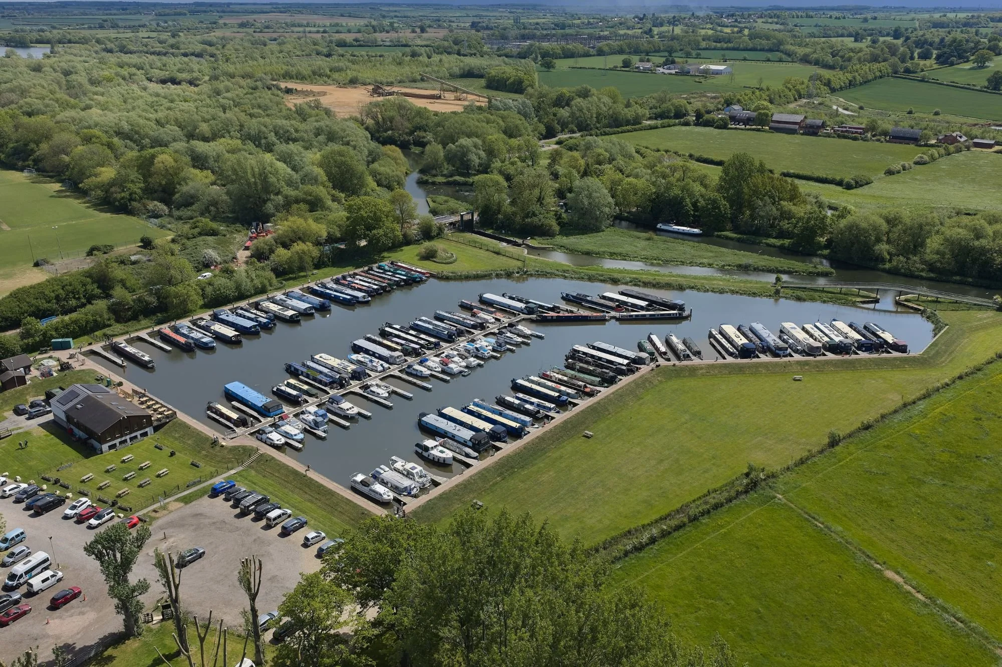 Overhead shot of the marina with the surrounding countryside
