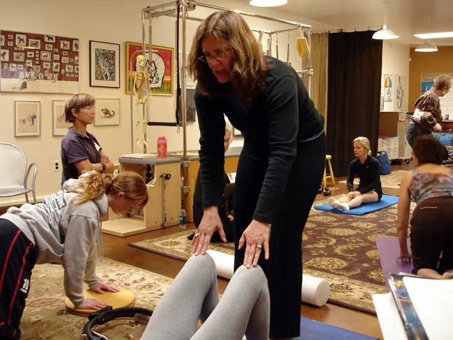 Pilates Specialist Katrina, working with Dressage riders in a Mat Pilates class.