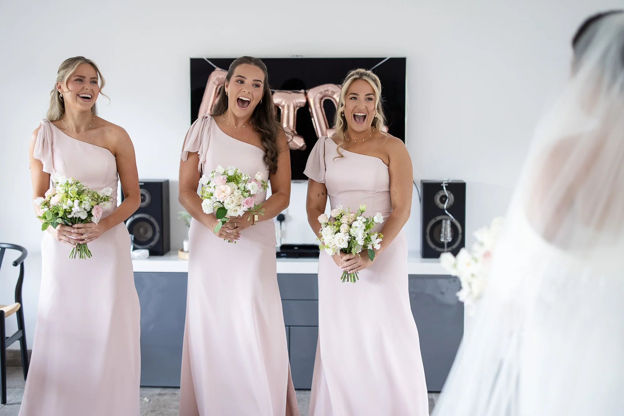 bridesmaids reveal seeing bride