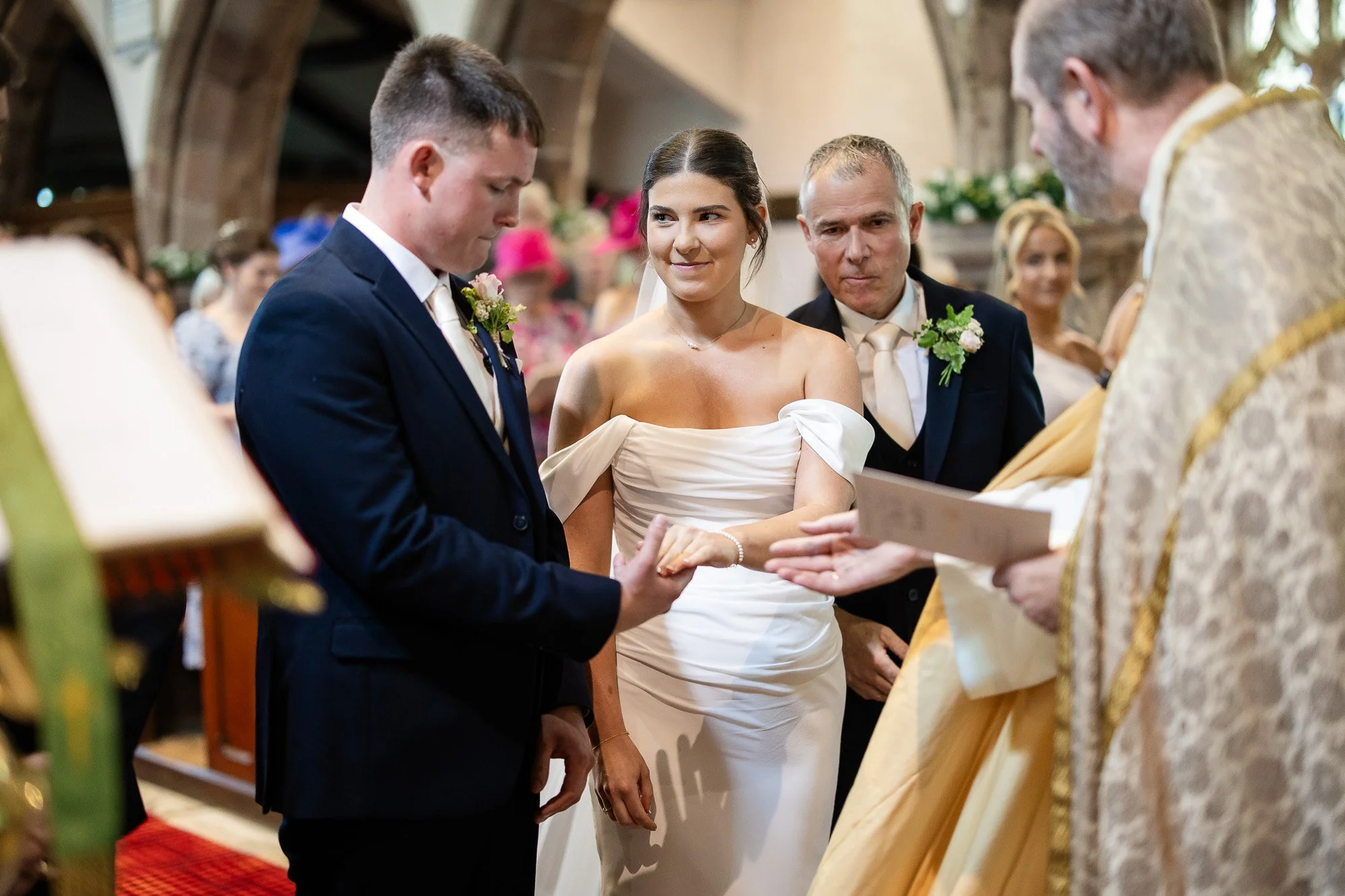 dad handing daughter over