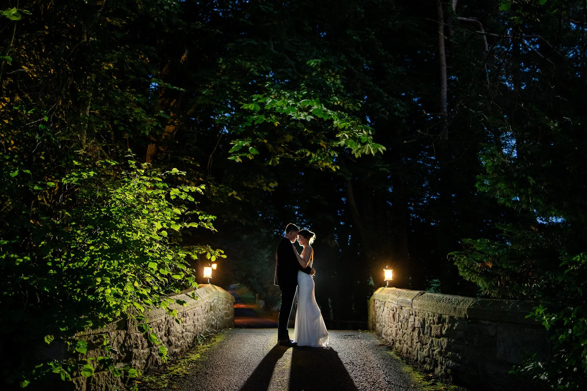night time portrait on bridge