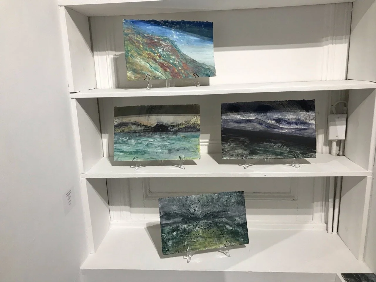 small paintings in the window at SEFA. Hudson, NY
