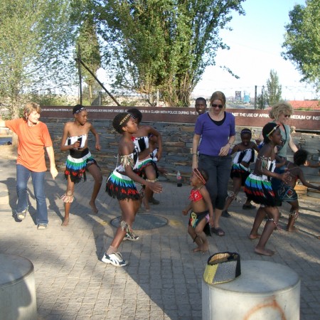 me-dancing-with-street-kids-in-soweto-teaching-them-to-say-no-to-abuse-450x450.jpg