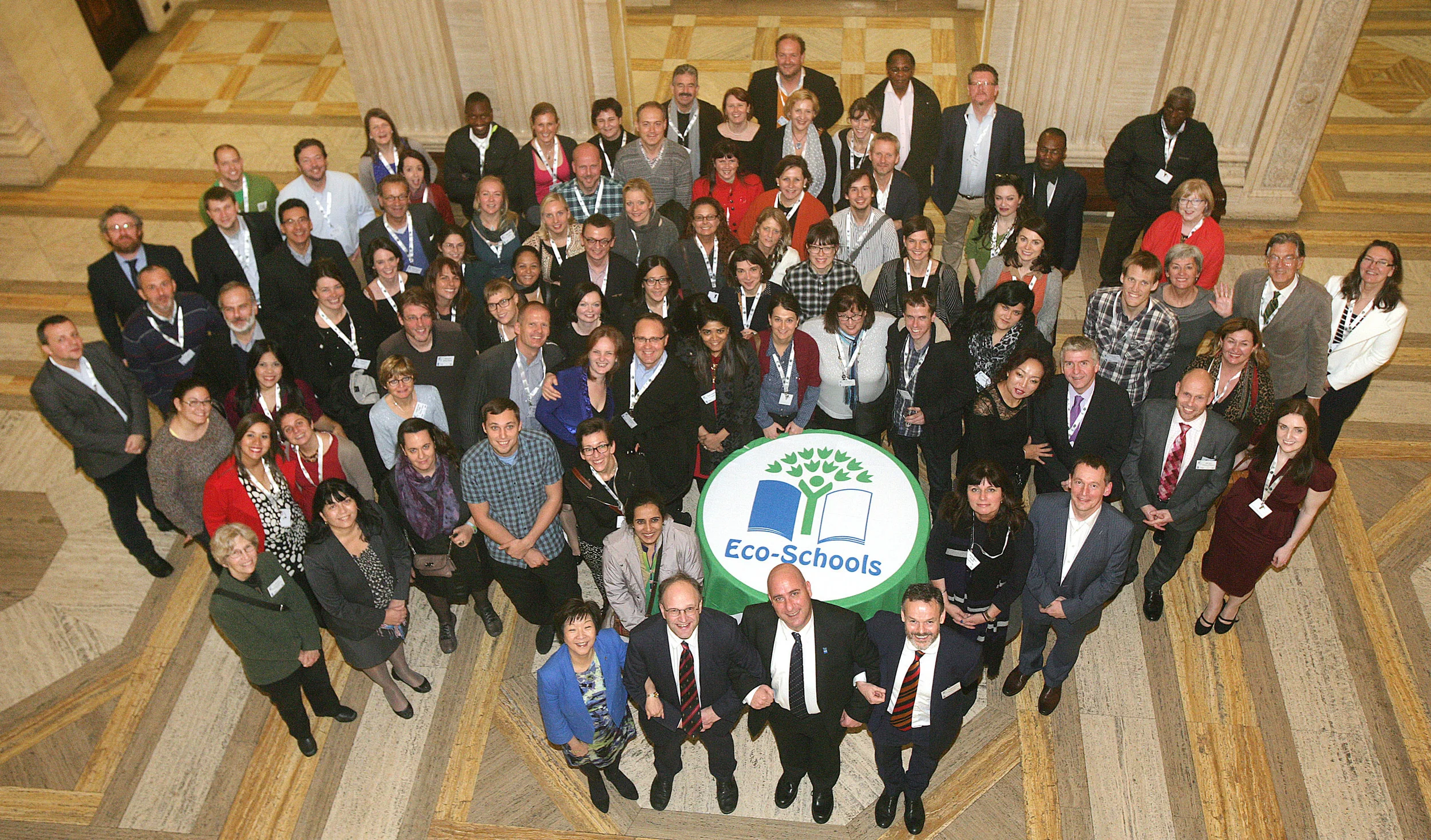 Keep Northern Ireland Beautiful hosted 100 delegates from 54 countries at the Foundation for Environmental Education’s Eco-Schools National Operator Meeting. They were welcomed to Northern Ireland with a reception at Stormont. Front Row: Anna Lo MLA, Chair of the Environment Committee; David Weir MLA, Chair of the Education Committee; Daniel Schaffer, CEO Foundation for Environmental Education and Tony Wilcox, Chair of Keep Northern Ireland Beautiful.