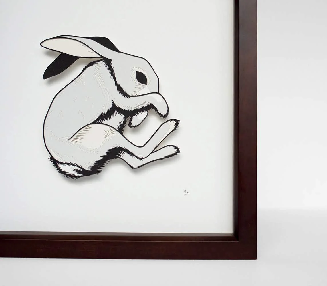 Gray rabbit papercut close up