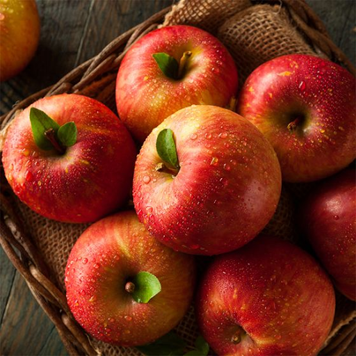 Fuji apples with deep red skin and subtle striping