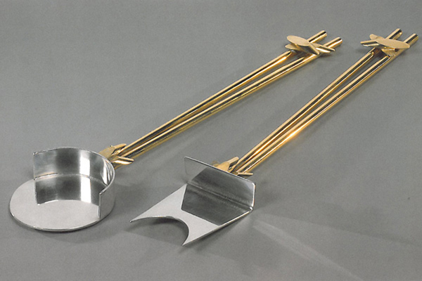   Serving Pieces  , 1999, pewter and brass, 1x3x15 inches  