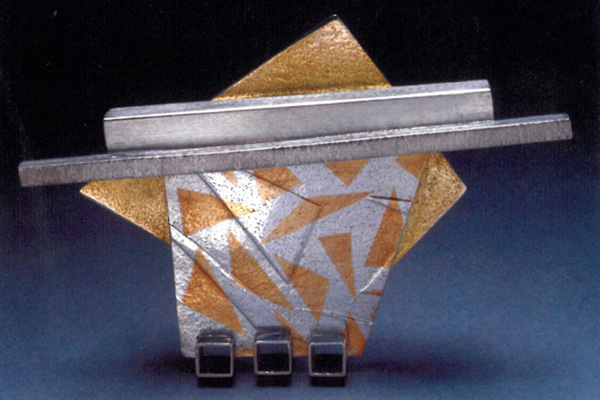   Pin , 1988, sterling silver, 18k gold and 24k gold overlay, 3.25x2.25x0.5 inches 