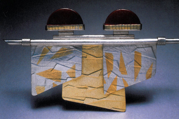   Pin  , 1988, sterling silver,18k gold, 24k gold overlay and red jasper, 5x3x0.5 inches  