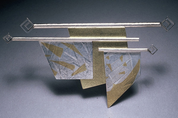   Pin  , 1985, sterling silver, 18k gold and 24k gold overlay  