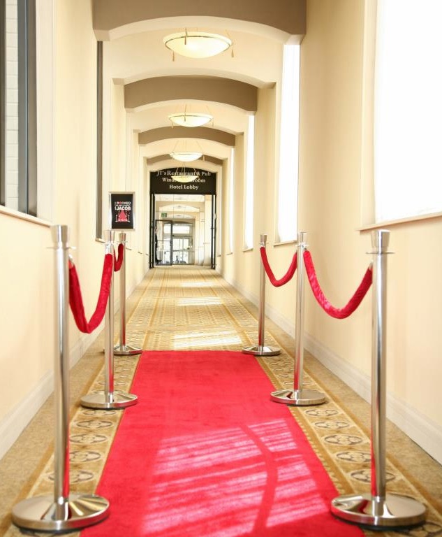 Custom Stanchion Sign and Red Carpet.jpg