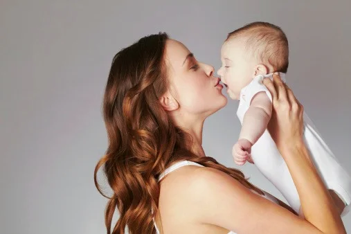 mom-kissing-baby.jpg