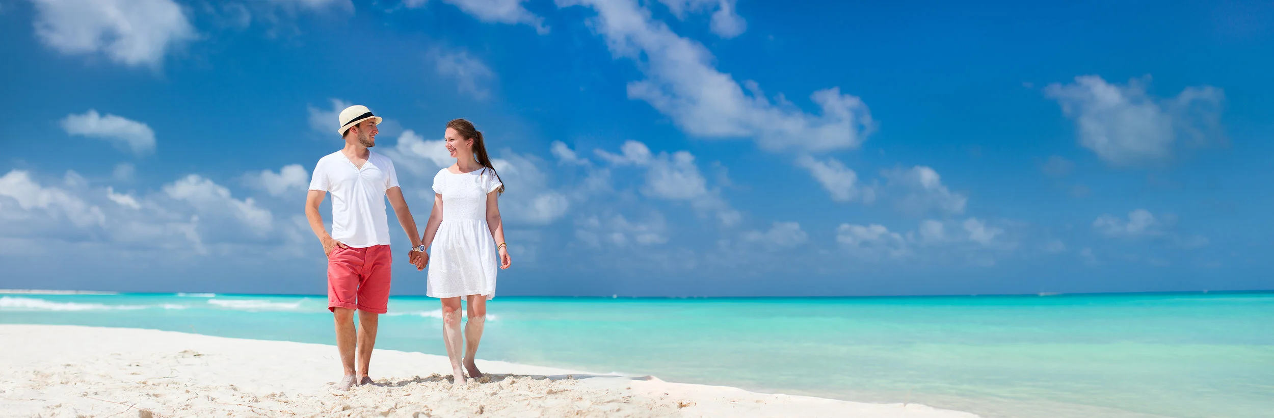 bigstock-Young-couple-tropical-at-beach-61567007.jpg