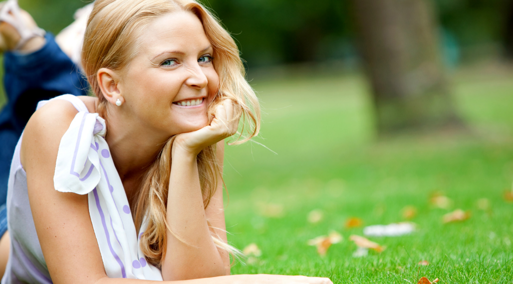 TCW-woman-smiling-park.png