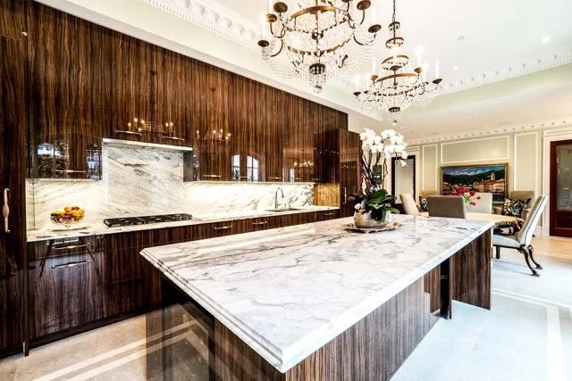   Kitchen’s Olivewood cabinets, French Riviera influenced   