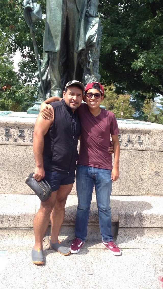 Irving Torres with his father.