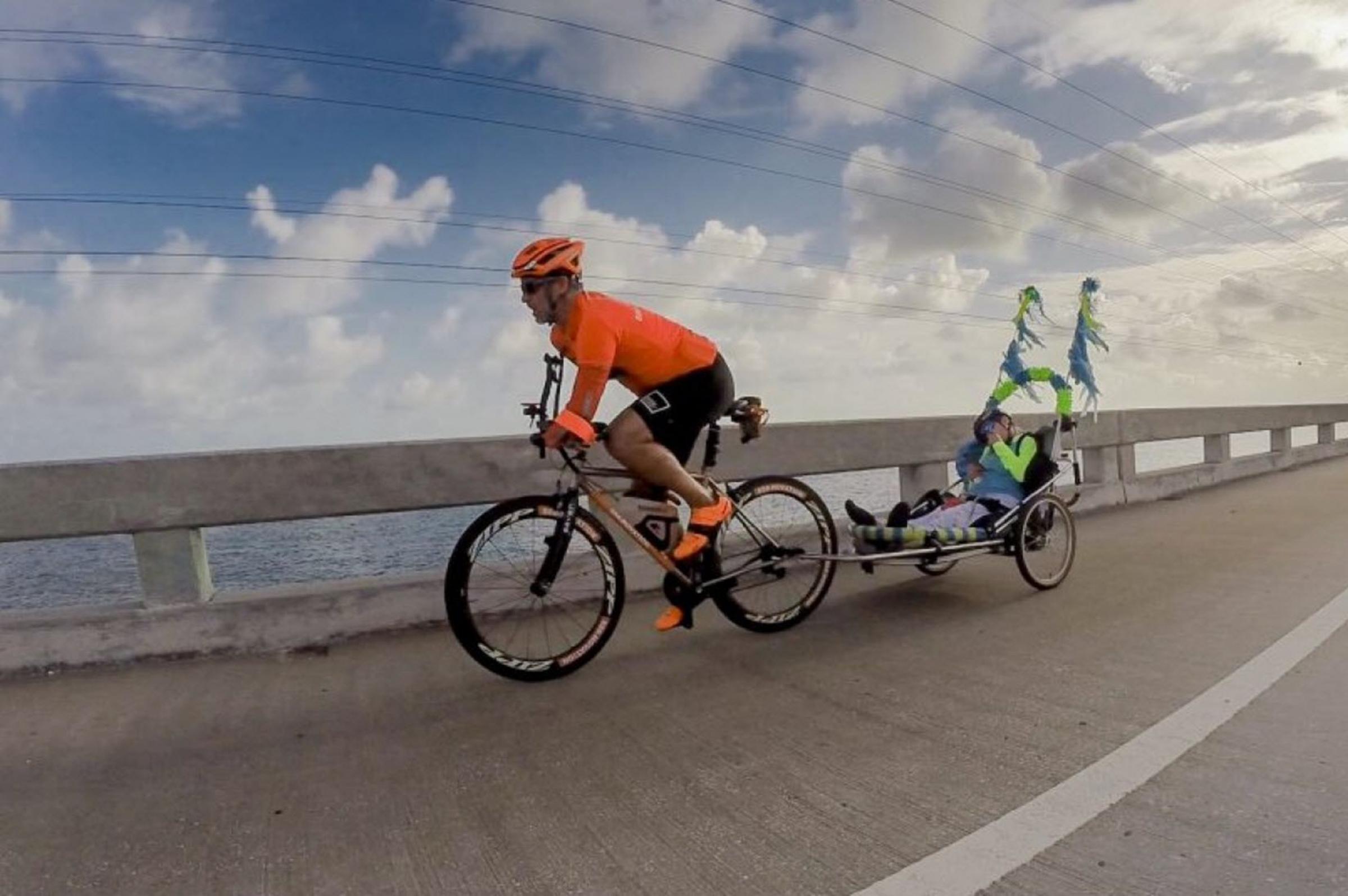 Hector and Kerry make up a dynamic racing team as they work together to complete a 50-mile cycling race through the Florida Keys