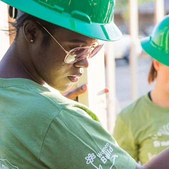  Team up to  build a home  for someone in need 