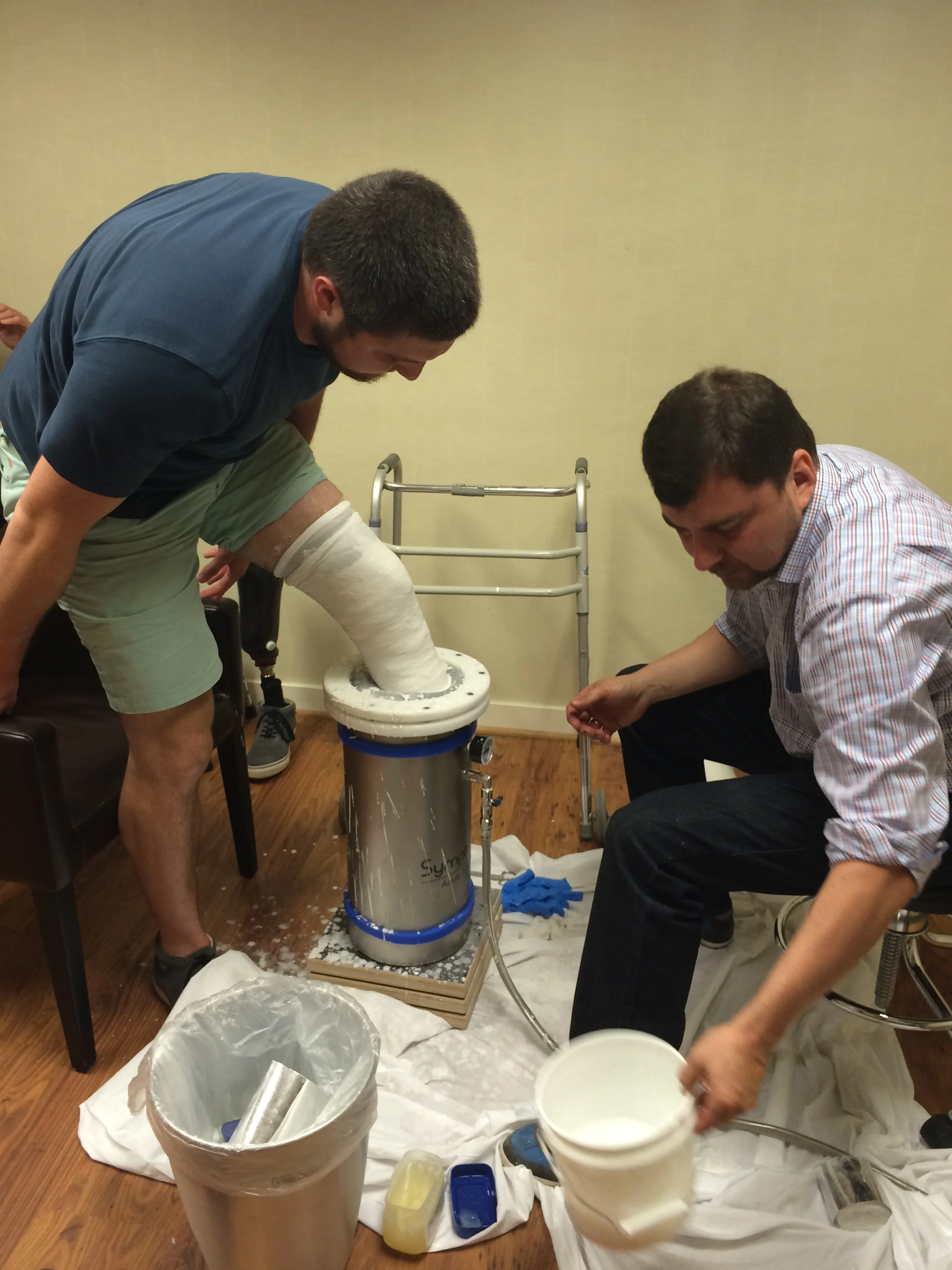 Placing the casted stump into the tank; you can see the water pushing the mesh up to the top