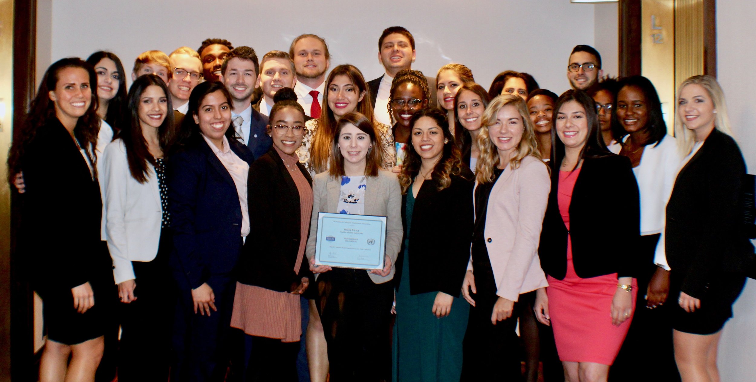 Student delegation in New York with their award
