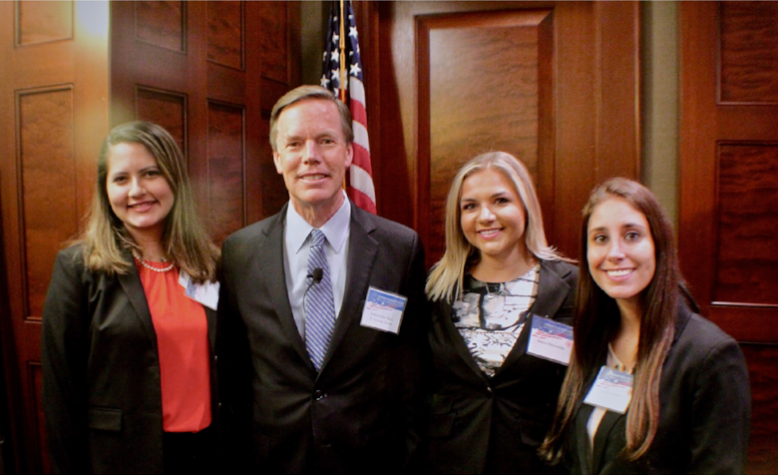 Maria, Jessica and Alexa with U.S. Ambassador Nicholas Burns at the Forum.