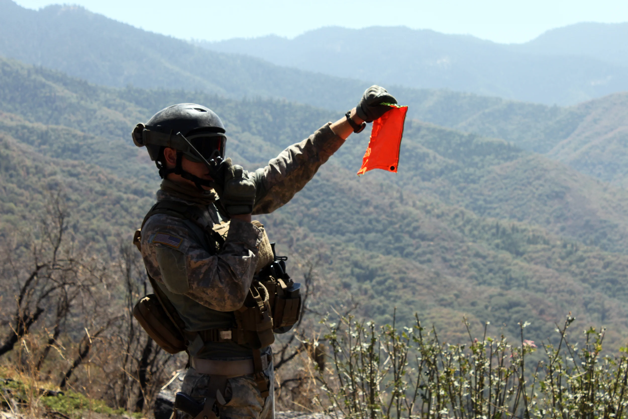 A California National Guard member on an operation to remove trash and irrigation lines from illegal grow sites. Photo: California National Guard.