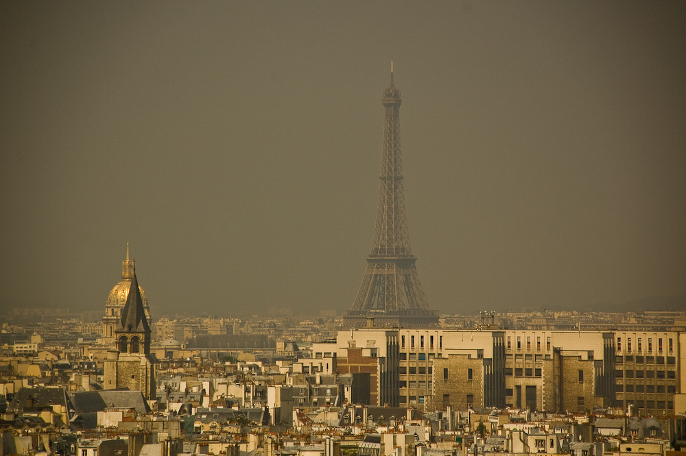The Eiffel Tower in Paris, France, seen through smog pollution. Photo: Olya Sanakoev