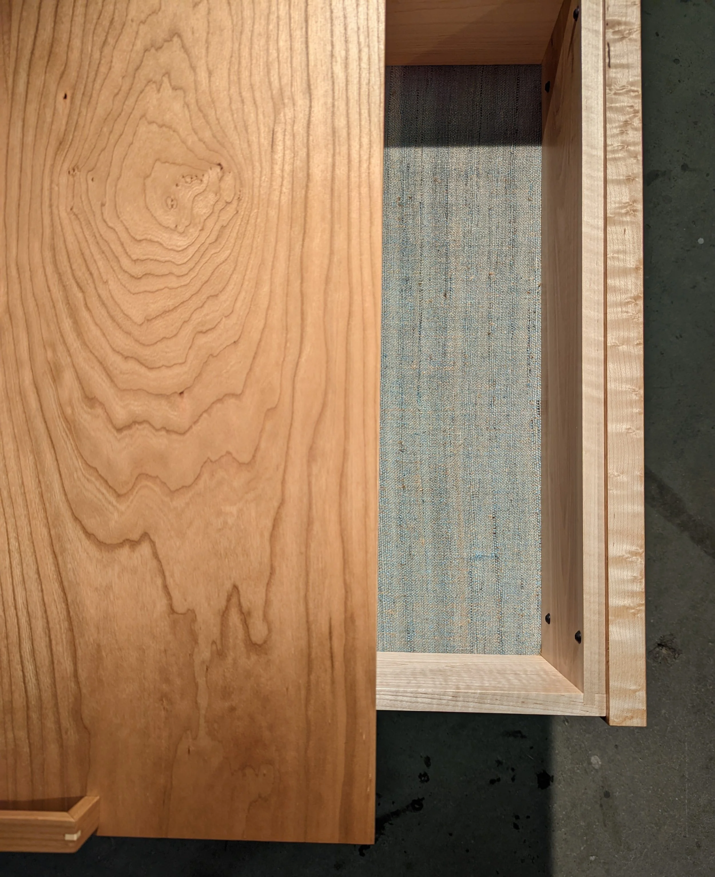 This couple's pair of Cherry and Big Leaf Maple Burl Nightstands feature a variety of details that vary based on the customer's preferences.