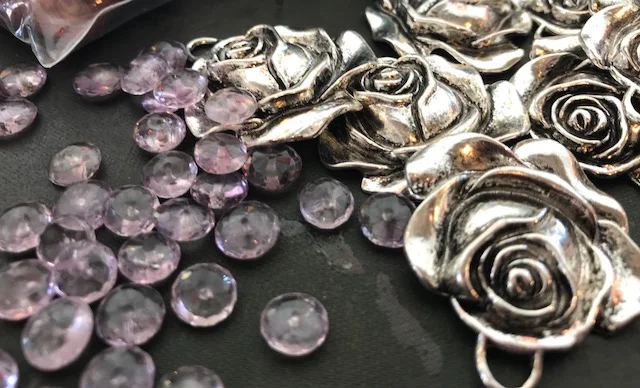 Each packet will receive 2 amethyst beads and one pewter rose