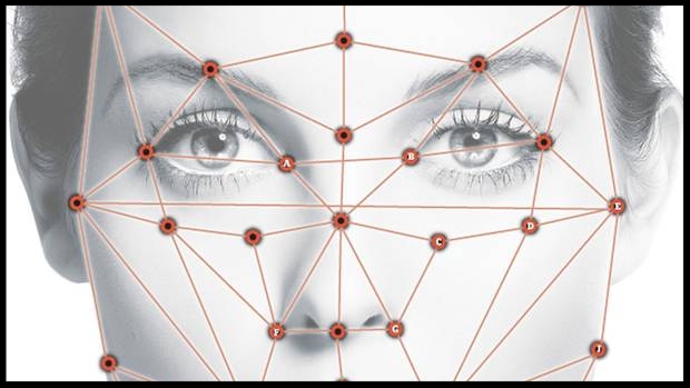 An overlay depicts how facial recognition software pinpoints certain features and compares them to a database. The distance between the eyes and the shape of the cheekbone can be used to determine characteristics like sex and age. (The Globe and Mail/The Globe and Mail)