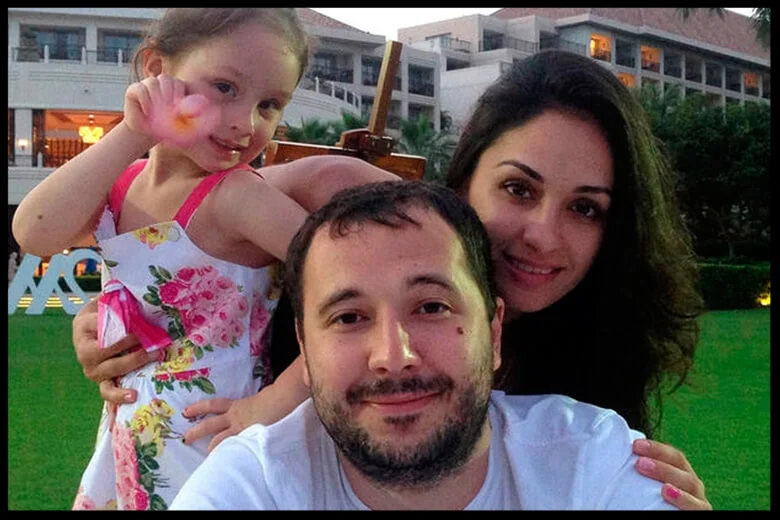 Roman Seleznev with his girlfriend Anna Otisko and her daughter, July 11, 2014