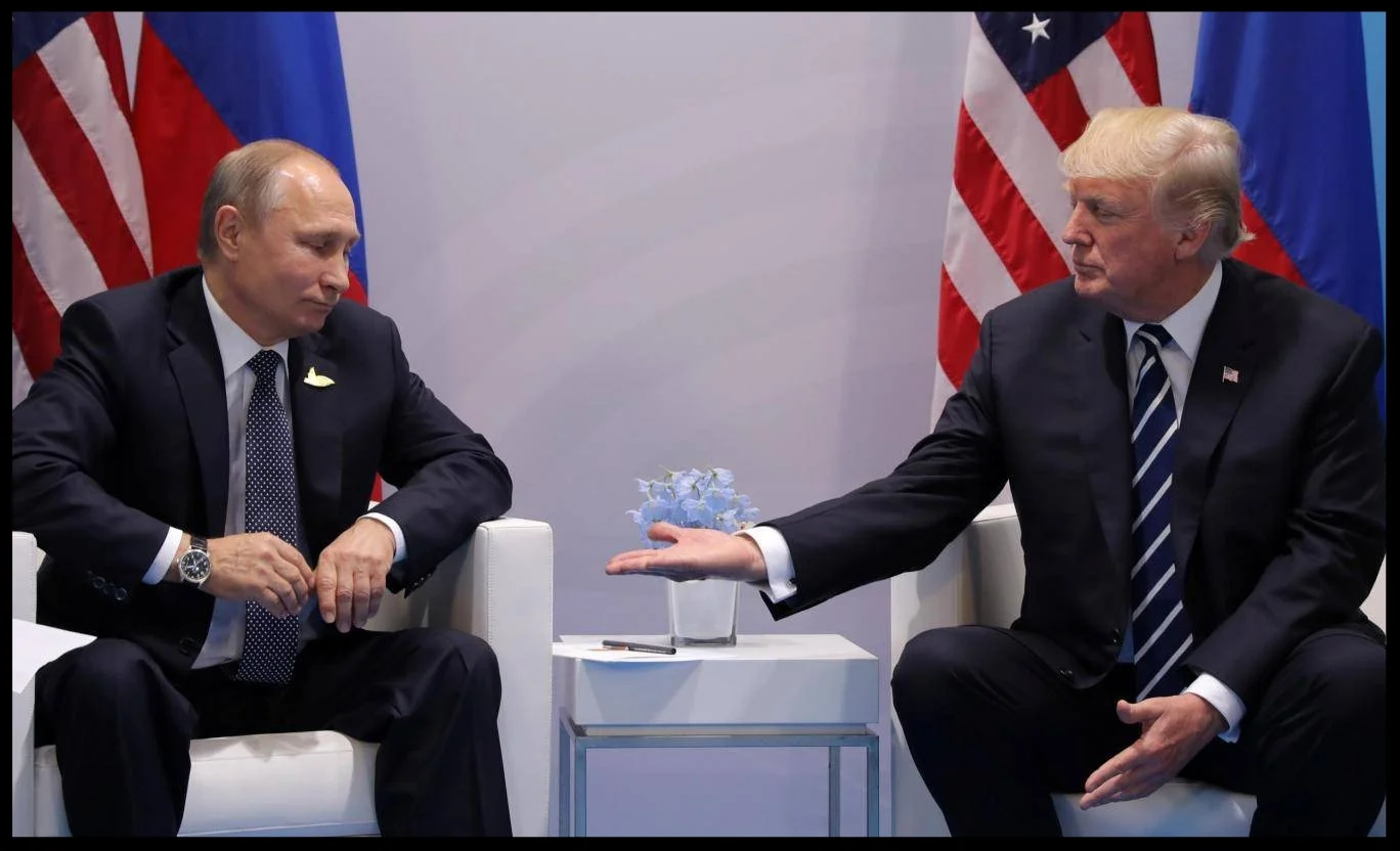 Russian leader Vladimir Putin (left) meeting US president Donald Trump Reuters