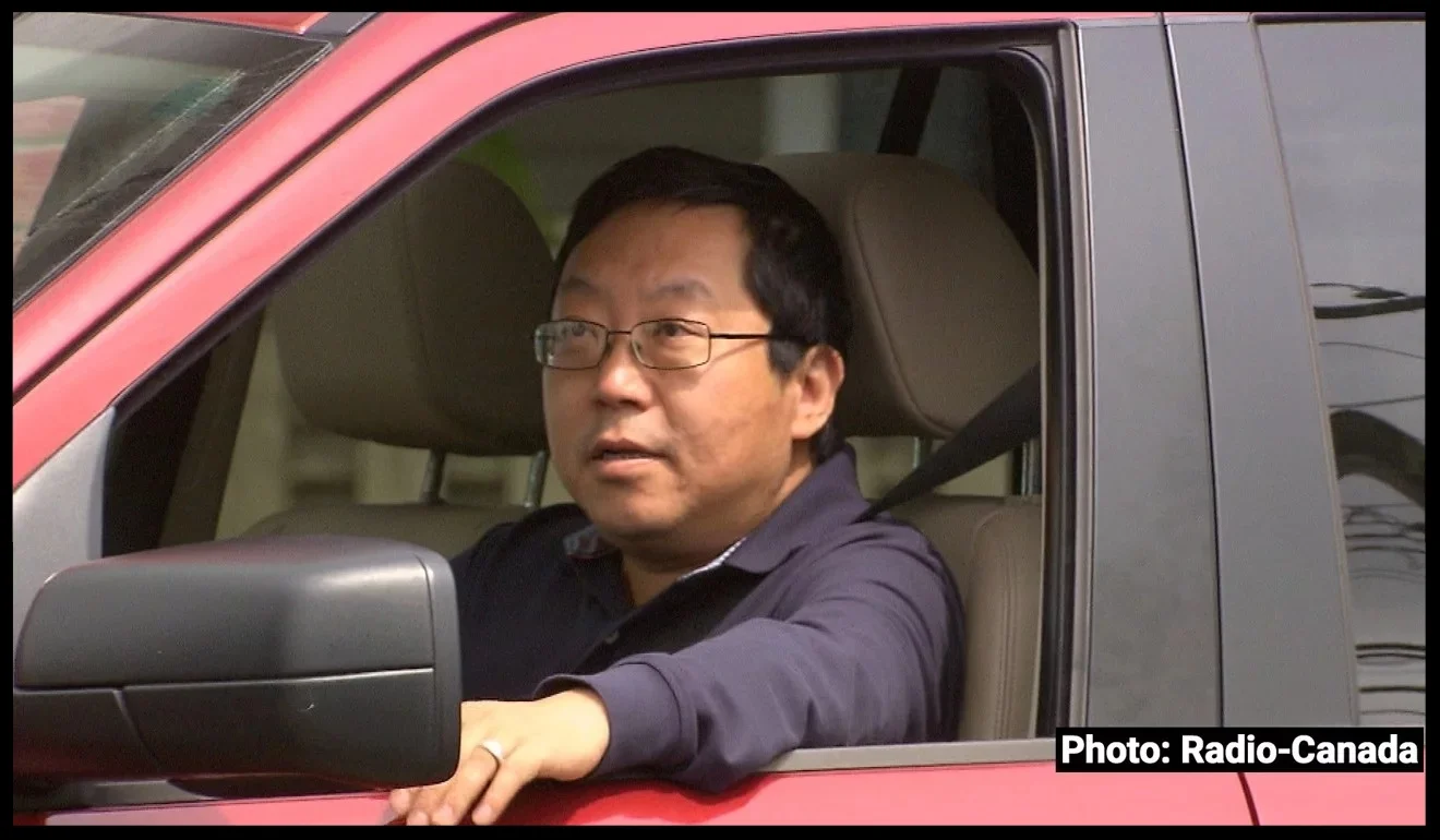 Former unlicensed immigration consultant Xun “Sunny” Wang is seen in a photo taken by Radio-Canada's investigative programme ‘Enquête’ as he was leaving his home in Richmond, British Columbia. Wang, who was freed from prison in late 2017, refused to answer Radio-Canada’s questions; nor did he respond to a written request for a response left by the ‘South China Morning Post’ at his home. Photo: Harold Dupuis/Radio-Canada