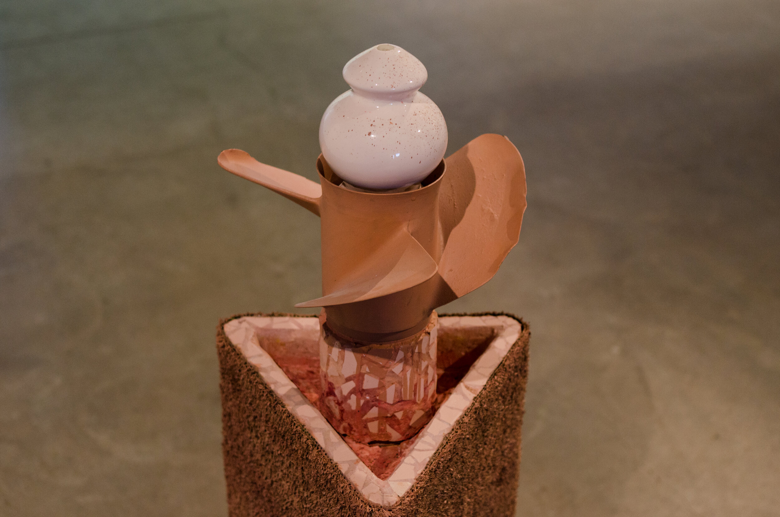  Detail of  Splayed Out,  found objects (ceramic insulator, propeller), astro turf, acrylic paint, tiles, grout, 2019  Photo credit: Mitchell Bright 