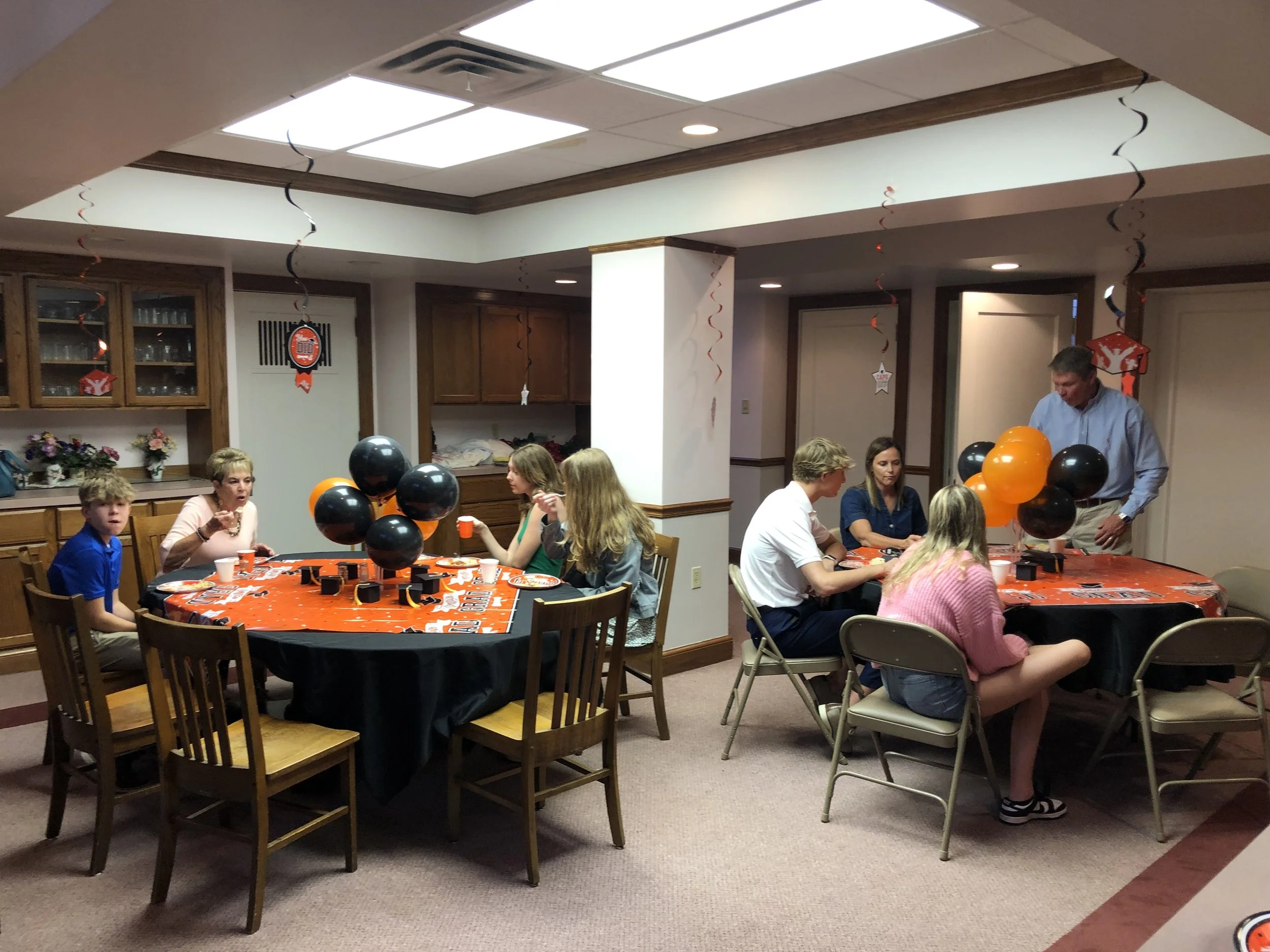  2024 FCP High School Graduates:  Left (Emma Spencer and Family); Right (Drew O'Brien and Family) 
