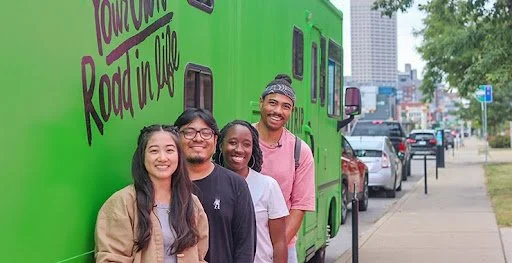 L to R: Julie, Anthoni, an interview subject, and Demaceo pictured outside their RV. Photo credit: Roadtrip Nation