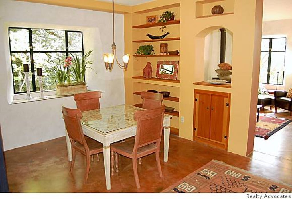  The dining room.&nbsp;The house requires very little heat, resulting in energy costs of $30 - $40 a month.  Photo: Realty Advocates 