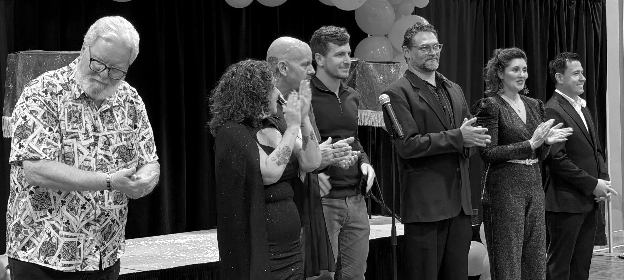 Christopher Moro with fellow performers at the Conjuring for a Cure curtain call