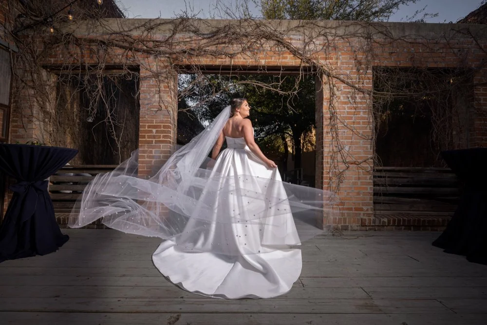 Bride with flowing veil at 4Eleven wedding venue in Fort Worth Texas