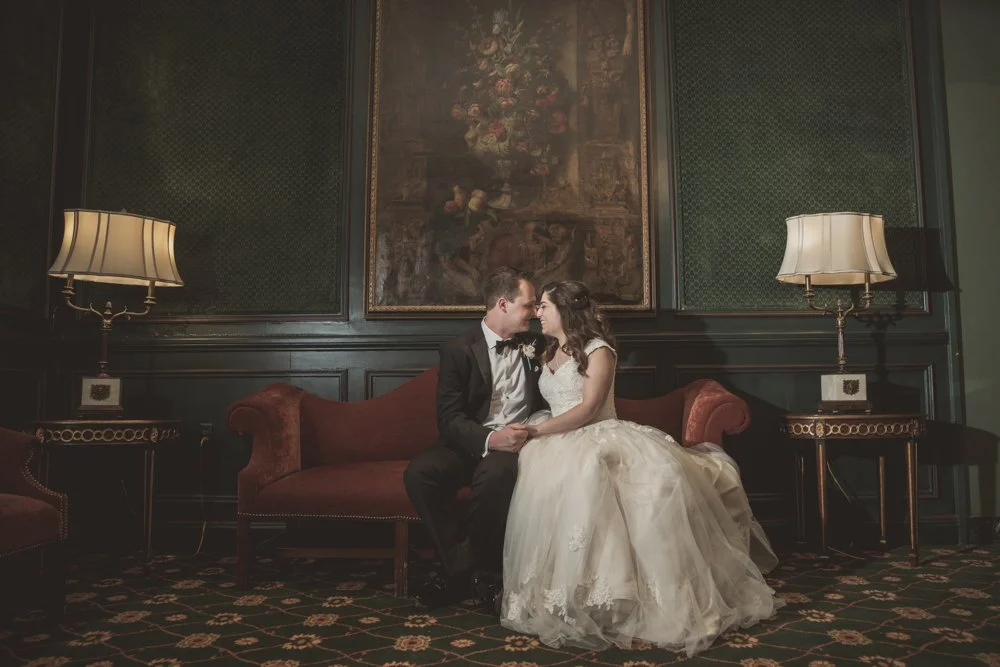 Wedding couple enjoying a meaningful moment during their celebration at The Fort Worth Club in Fort Worth Texas.