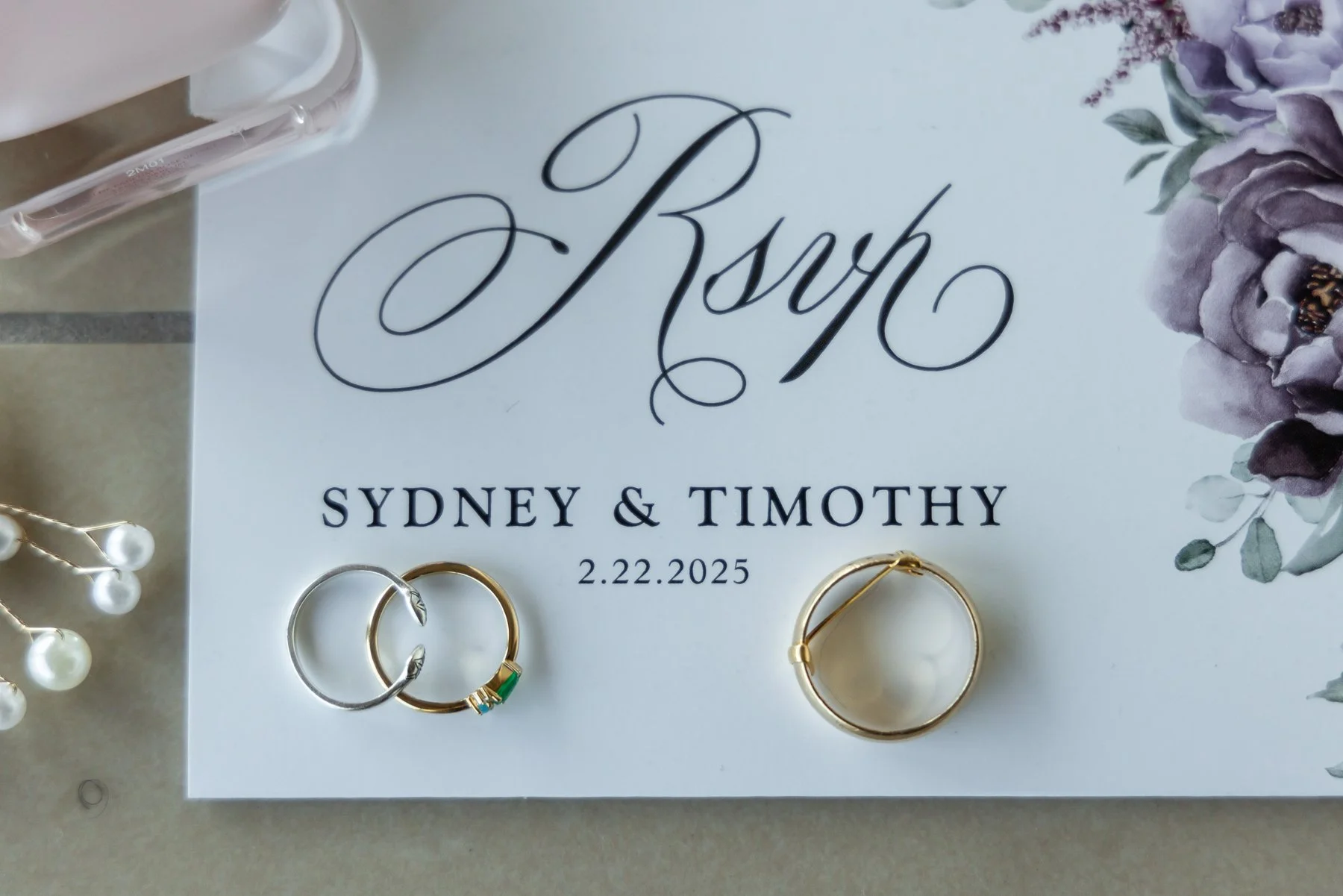 Wedding rings photographed with personalized details during an Omni Dallas Hotel wedding
