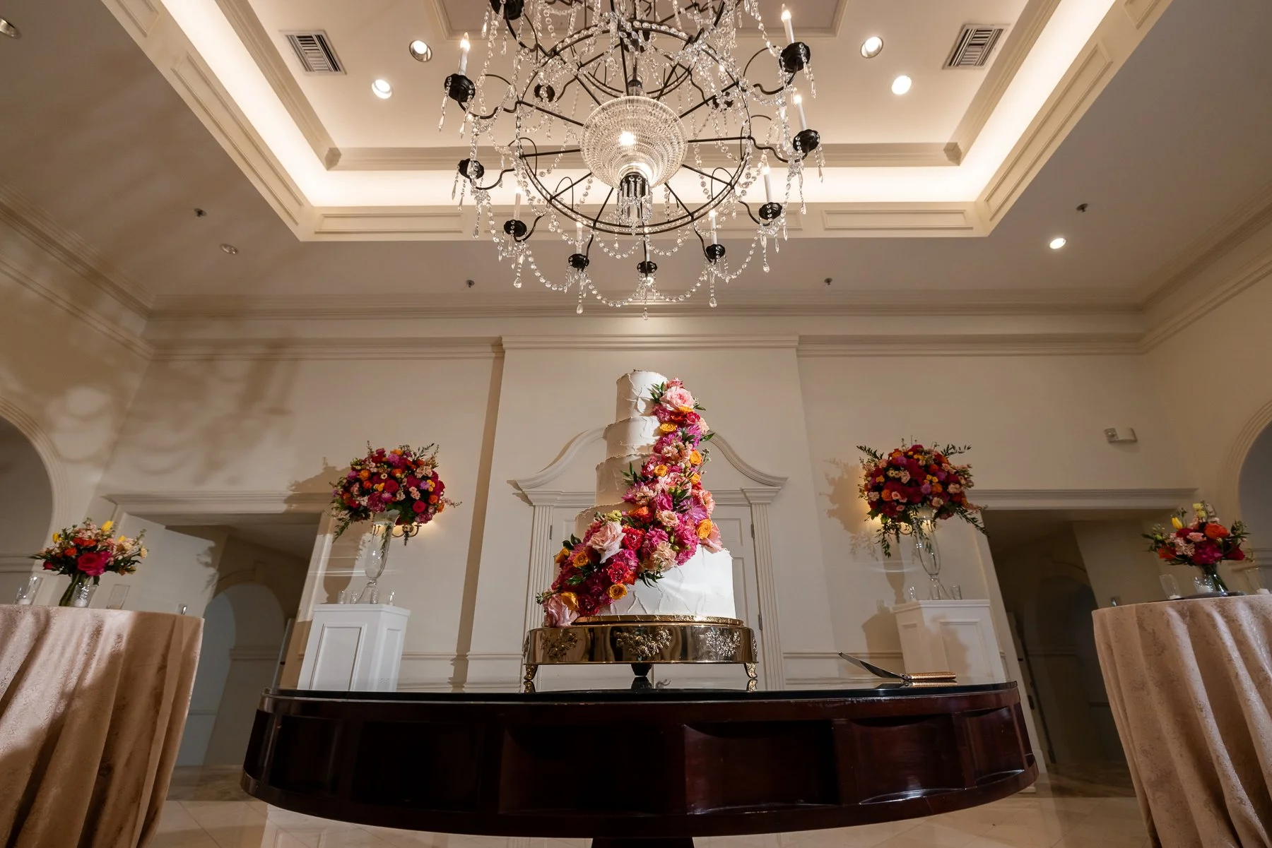 Wedding cake displayed during an Arlington Hall reception in Dallas.