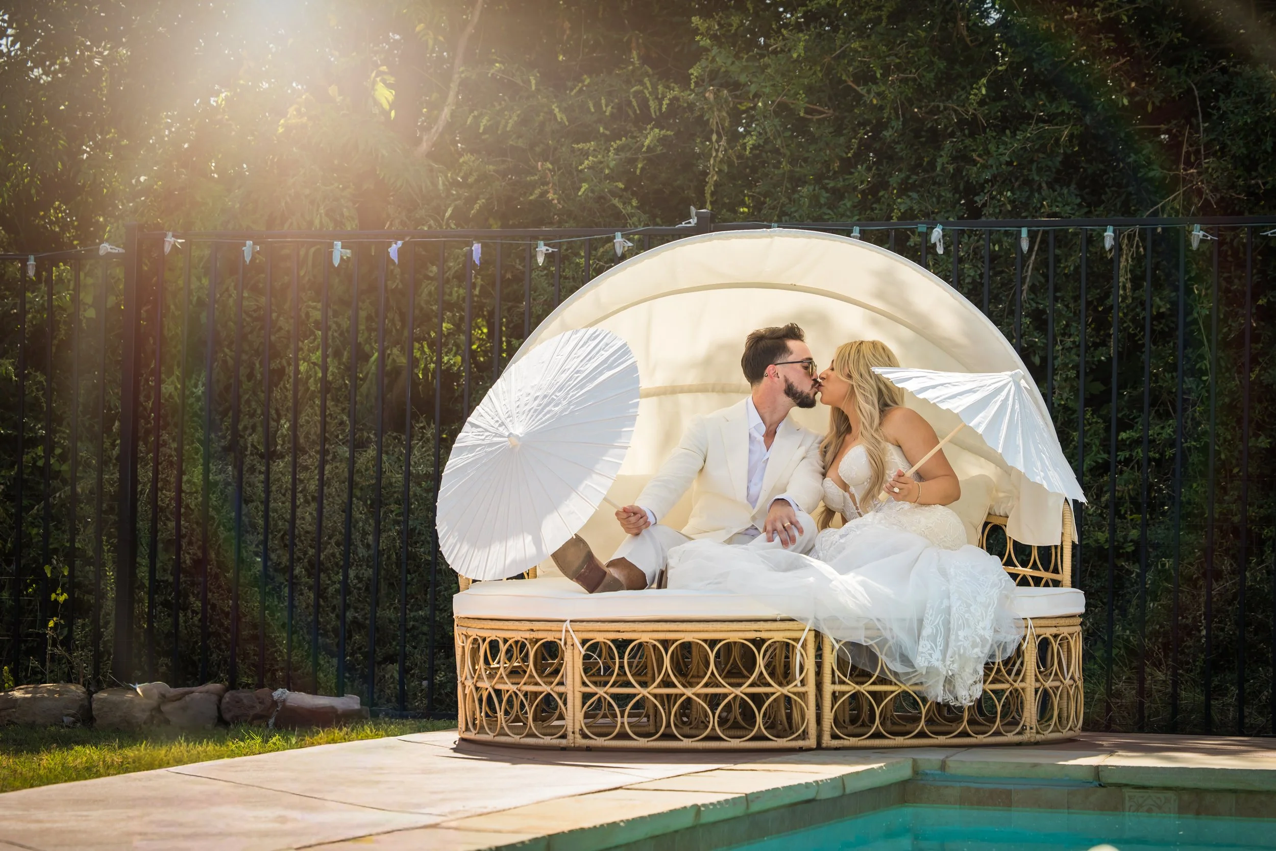 Bride and groom photographed in bright Texas sunlight during an outdoor Dallas–Fort Worth wedding