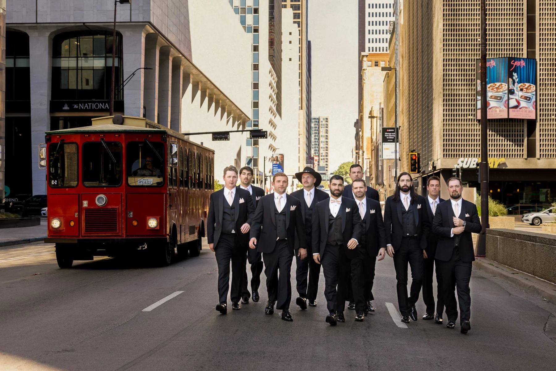 Groom and groomsmen portrait during a wedding at The Westin Dallas Downtown