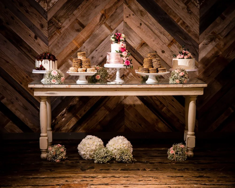 Wedding cake and dessert display at The Brik in Fort Worth, Texas.