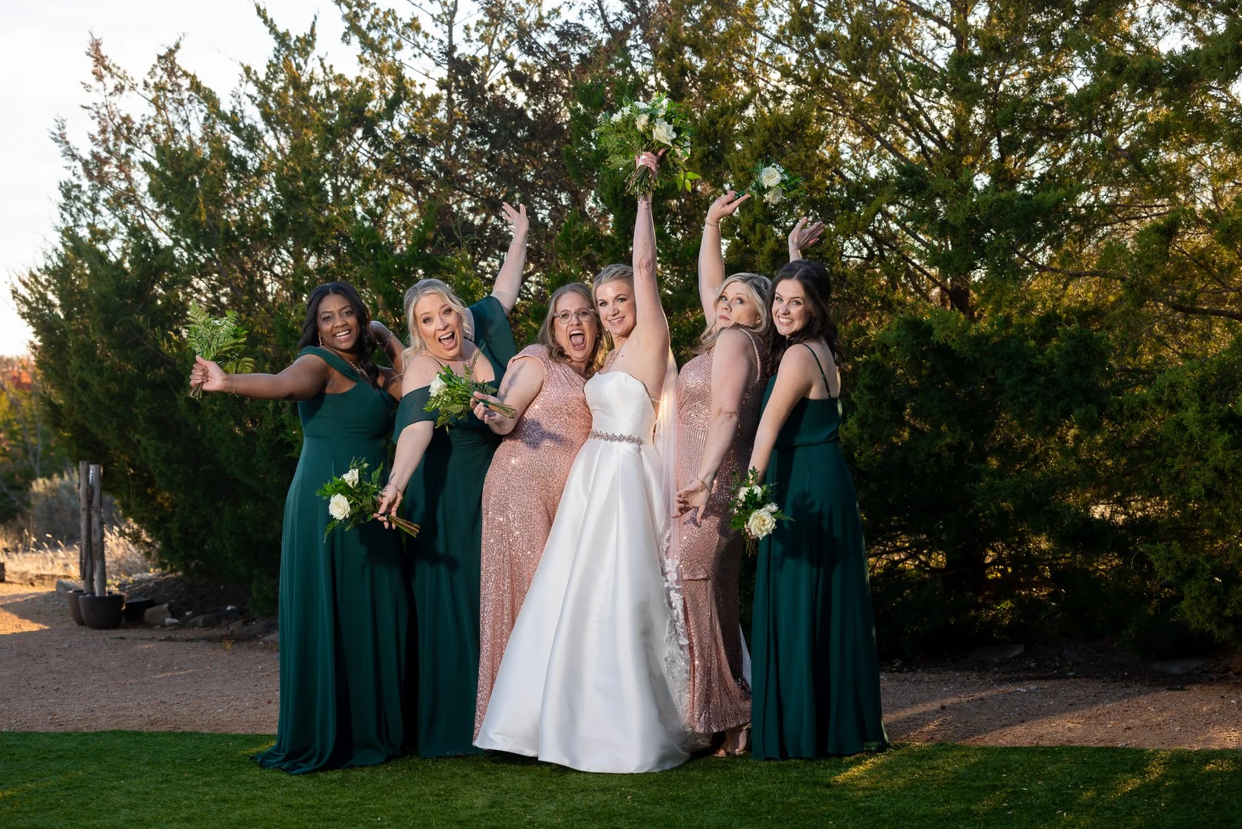 Bride with her bridesmaids outside Stone Crest Venue in McKinney, TX.